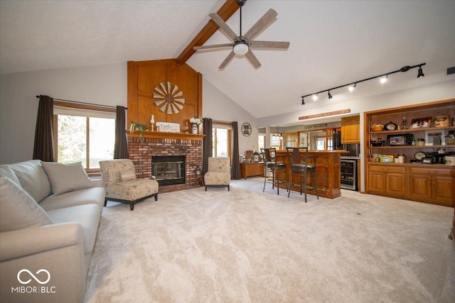 2259 Willow Lake Dr, Greenwood, IN 46143 - living area featuring healthy amount of natural light, beverage cooler, light colored carpet, and ceiling fan