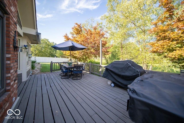 2259 Willow Lake Dr, Greenwood, IN 46143 - wooden deck with outdoor dining space and a grill