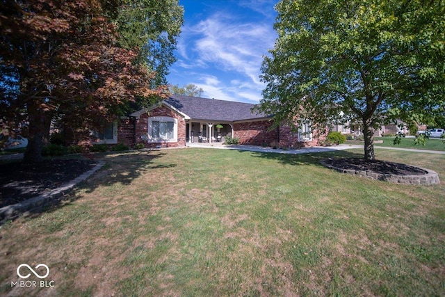2259 Willow Lake Dr, Greenwood, IN 46143 - view of front facade with a front lawn and brick siding