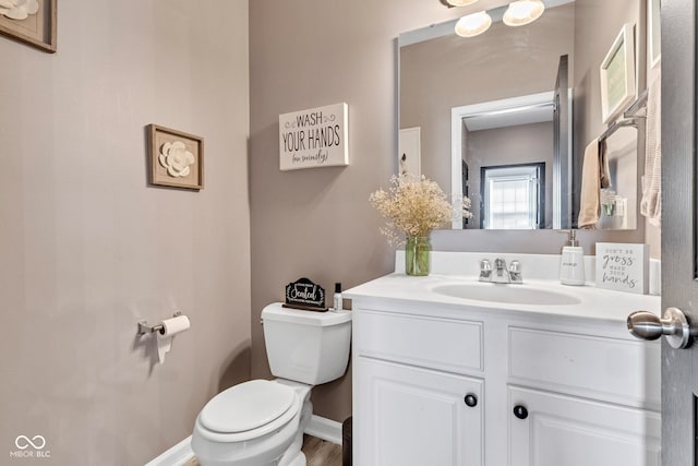 5961 Pine Bluff Dr, Avon, IN 46123 - half bathroom featuring vanity and wood finished floors