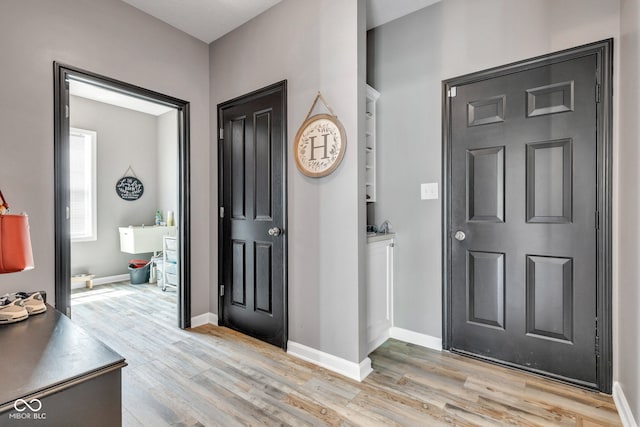 5961 Pine Bluff Dr, Avon, IN 46123 - foyer entrance featuring light wood finished floors