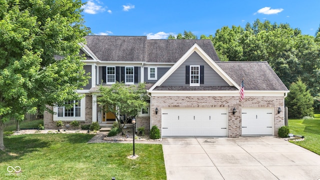 5961 Pine Bluff Dr, Avon, IN 46123 - view of front of home with concrete driveway, brick siding, a front lawn, and a shingled roof