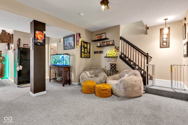 5961 Pine Bluff Dr, Avon, IN 46123 - sitting room with carpet flooring and stairway