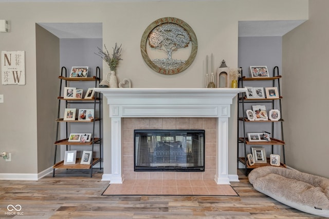 5961 Pine Bluff Dr, Avon, IN 46123 - living area with wood finished floors and a tile fireplace