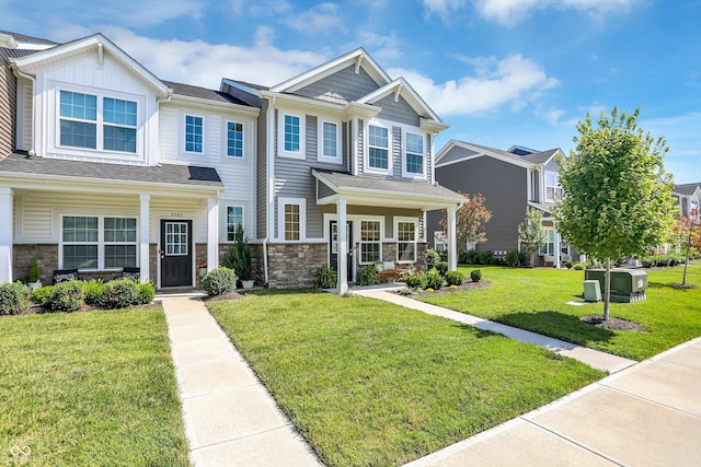 3588 Thomas Jefferson St, Westfield, IN 46074 - craftsman house with a front lawn, stone siding, and a porch
