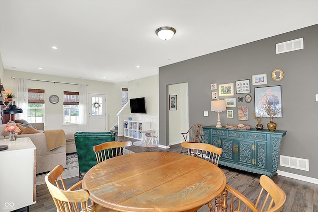 3588 Thomas Jefferson St, Westfield, IN 46074 - dining area featuring dark wood finished floors, stairway, and recessed lighting