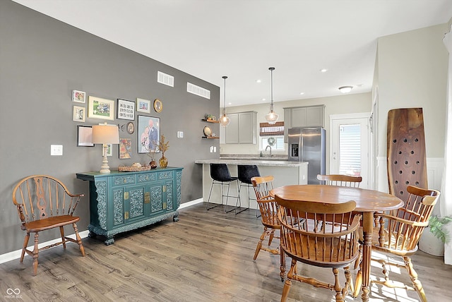 3588 Thomas Jefferson St, Westfield, IN 46074 - dining room with light wood-type flooring and recessed lighting