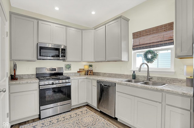 3588 Thomas Jefferson St, Westfield, IN 46074 - kitchen featuring appliances with stainless steel finishes, light countertops, light wood-style floors, and recessed lighting