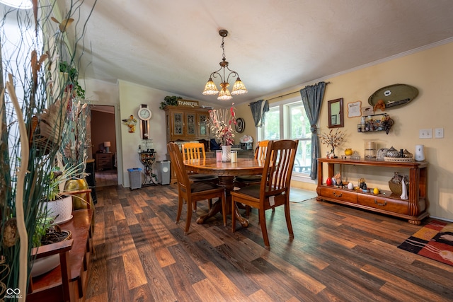2501 Mitten Rd, Bowling Green, IN 47833 - dining area featuring a chandelier, wood finished floors, crown molding, and lofted ceiling
