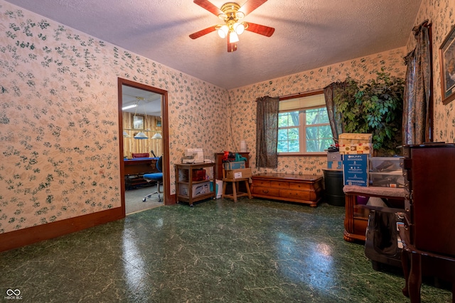 2501 Mitten Rd, Bowling Green, IN 47833 - sitting room with wallpapered walls, a textured ceiling, ceiling fan, and tile patterned floors