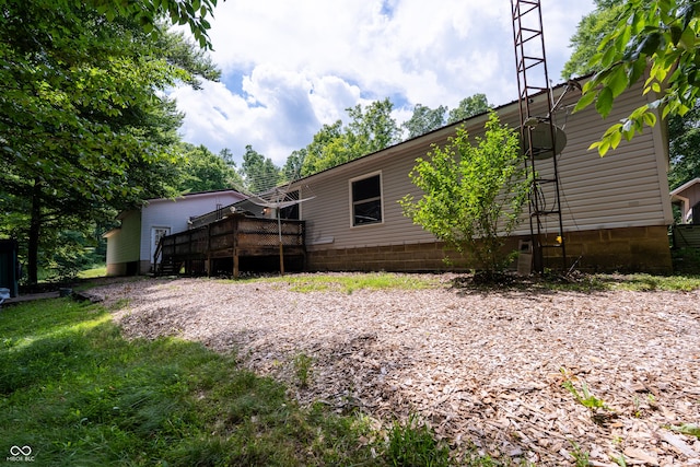 2501 Mitten Rd, Bowling Green, IN 47833 - back of property with a wooden deck
