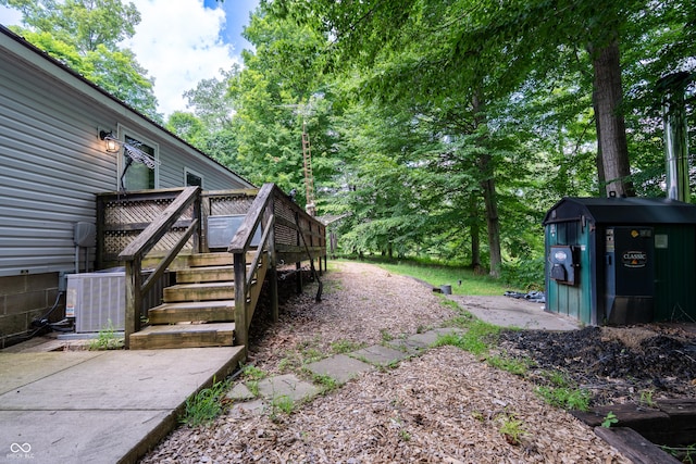 2501 Mitten Rd, Bowling Green, IN 47833 - view of yard featuring a wooden deck and stairs