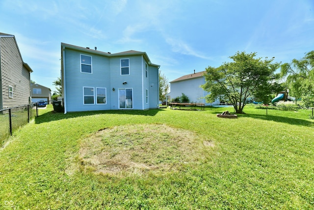 2016 Morning Light Ln, Greenwood, IN 46143 - rear view of property with an outdoor fire pit