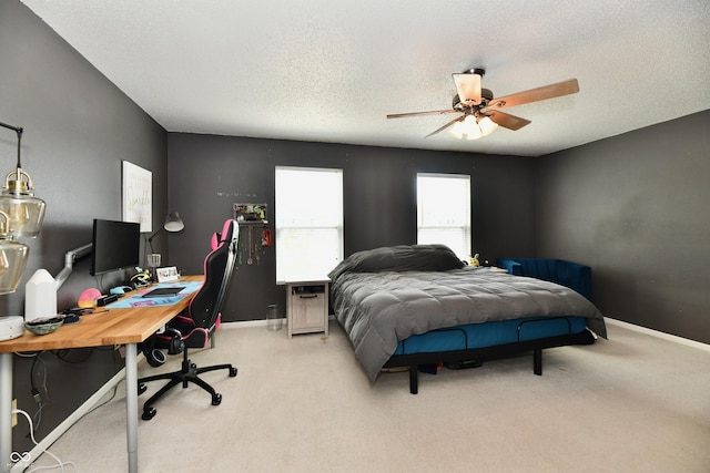 2016 Morning Light Ln, Greenwood, IN 46143 - bedroom with a desk, light colored carpet, ceiling fan, and a textured ceiling