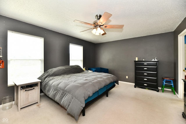 2016 Morning Light Ln, Greenwood, IN 46143 - bedroom with light carpet, a textured ceiling, and a ceiling fan