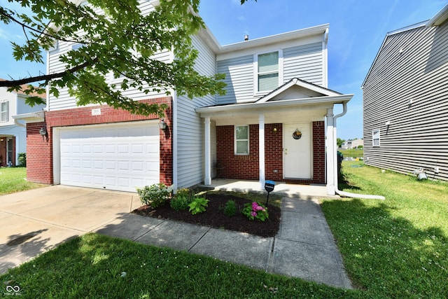 2016 Morning Light Ln, Greenwood, IN 46143 - traditional home featuring brick siding, driveway, a garage, a front yard, and a porch