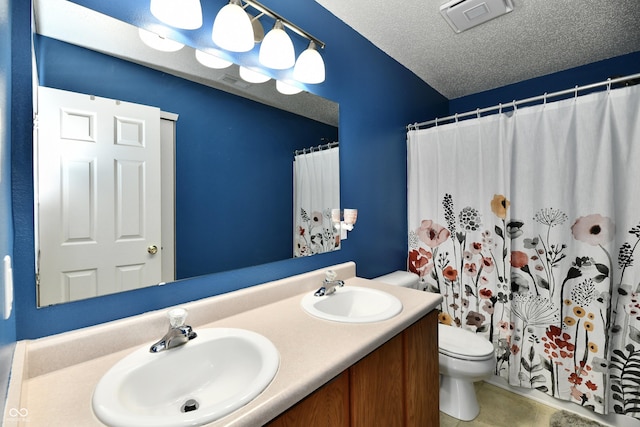 2016 Morning Light Ln, Greenwood, IN 46143 - full bathroom with double vanity, a textured ceiling, curtained shower, and tile patterned flooring