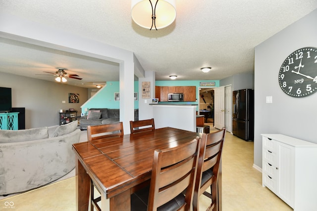 2016 Morning Light Ln, Greenwood, IN 46143 - dining space featuring a textured ceiling and a ceiling fan