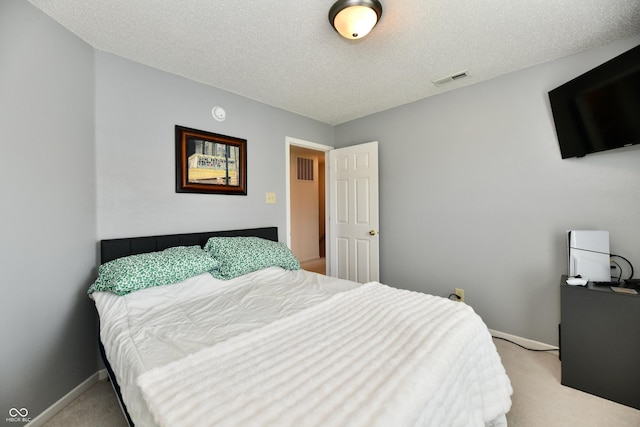 2016 Morning Light Ln, Greenwood, IN 46143 - bedroom featuring light carpet and a textured ceiling