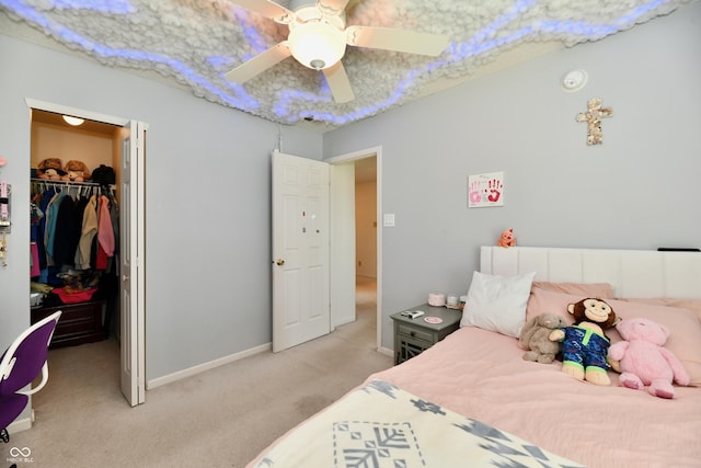 2016 Morning Light Ln, Greenwood, IN 46143 - bedroom with carpet, a spacious closet, a closet, and a ceiling fan