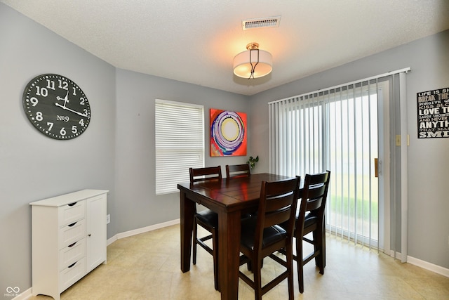 2016 Morning Light Ln, Greenwood, IN 46143 - dining space with plenty of natural light and light tile patterned flooring
