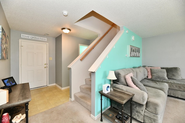2016 Morning Light Ln, Greenwood, IN 46143 - carpeted living area featuring stairway and a textured ceiling