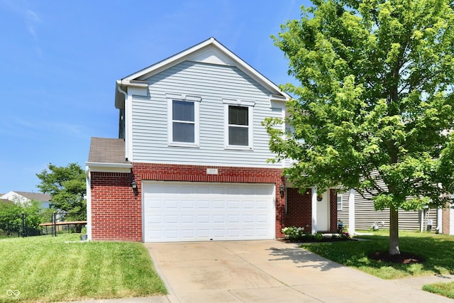 2016 Morning Light Ln, Greenwood, IN 46143 - traditional-style home featuring brick siding, concrete driveway, and an attached garage