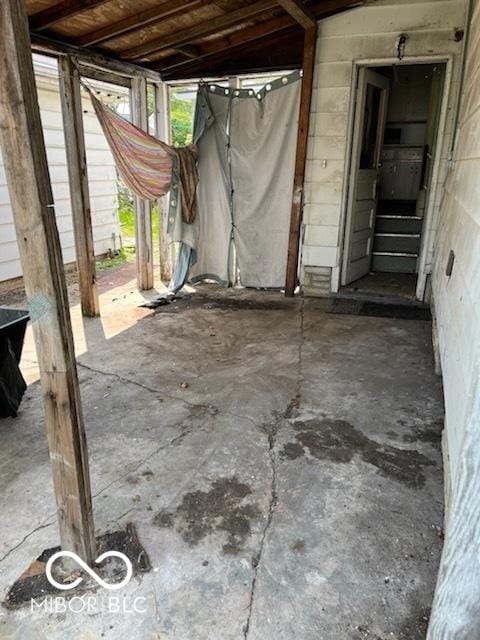 518 E Irvington Ave, South Bend, IN 46614 - miscellaneous room with unfinished concrete floors