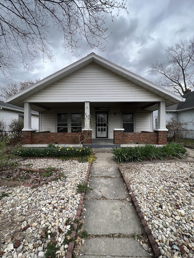 849 S Belleview Pl, Indianapolis, IN 46221 - view of front of home featuring covered porch and brick siding
