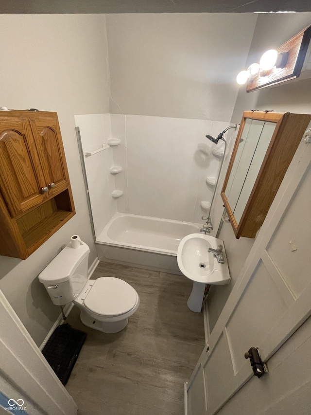 849 S Belleview Pl, Indianapolis, IN 46221 - full bathroom with wood finished floors and shower / bath combination