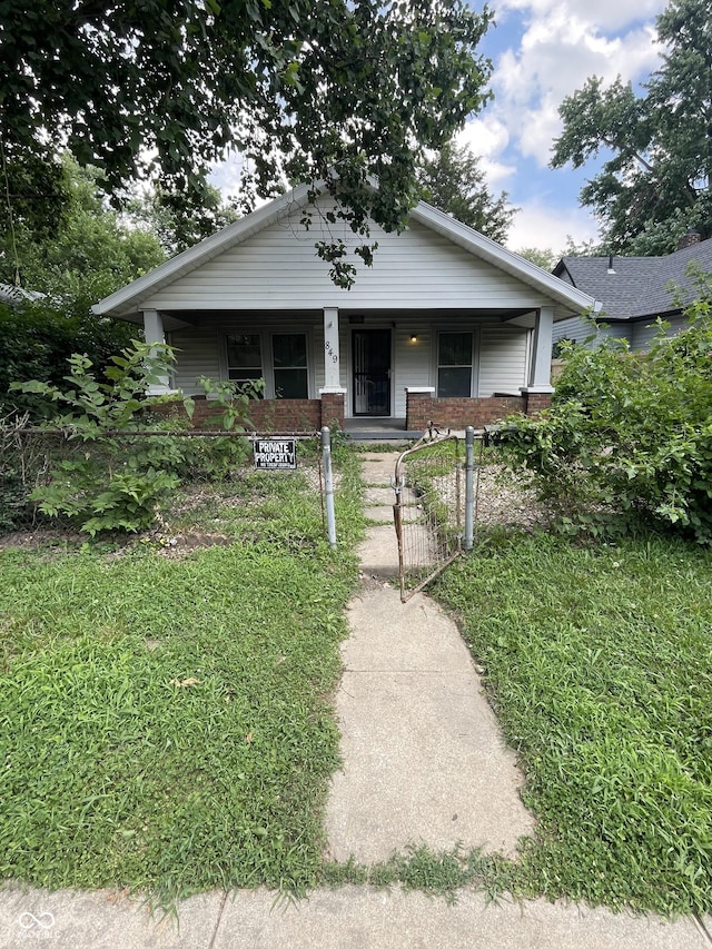 849 S Belleview Pl, Indianapolis, IN 46221 - bungalow-style house featuring covered porch and brick siding