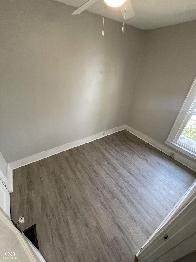 849 S Belleview Pl, Indianapolis, IN 46221 - empty room featuring dark wood-style floors and ceiling fan