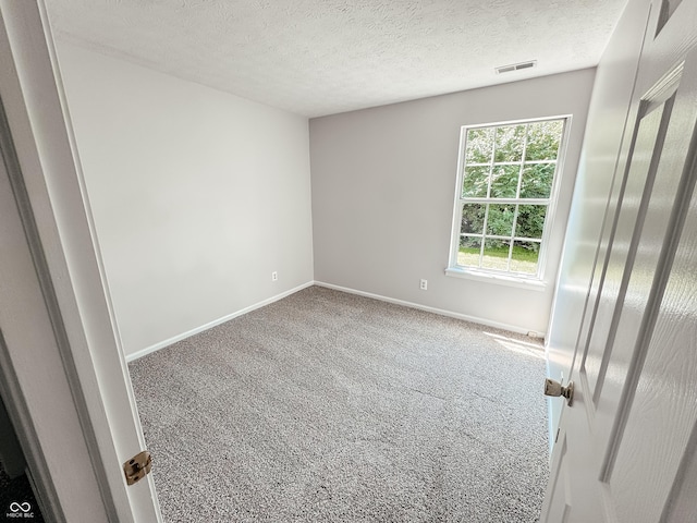 9672 River Oak Ln E, Fishers, IN 46038 - carpeted spare room featuring baseboards and a textured ceiling