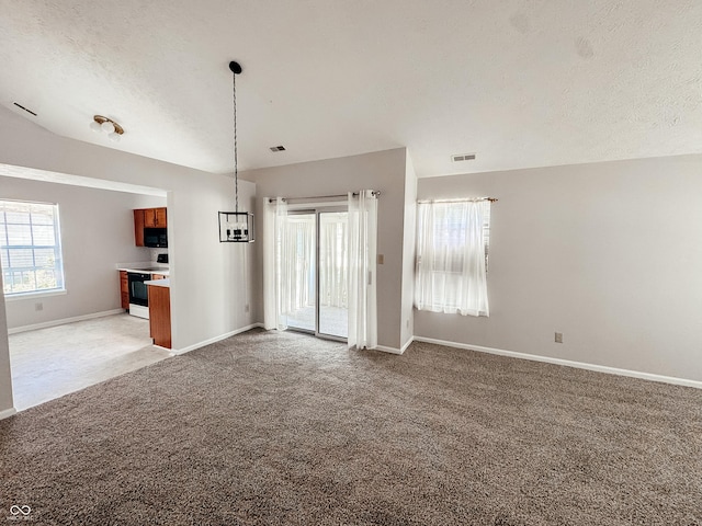 9672 River Oak Ln E, Fishers, IN 46038 - unfurnished living room with light carpet and a textured ceiling