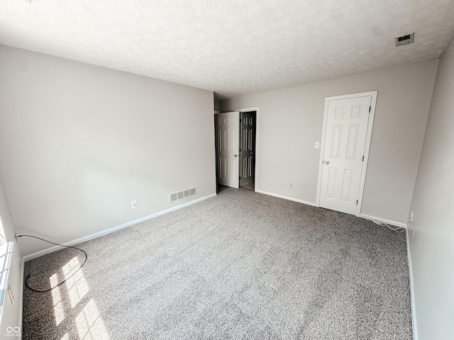 9672 River Oak Ln E, Fishers, IN 46038 - empty room with carpet floors and a textured ceiling
