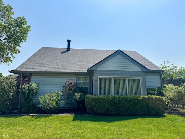 9672 River Oak Ln E, Fishers, IN 46038 - back of house with a yard and roof with shingles