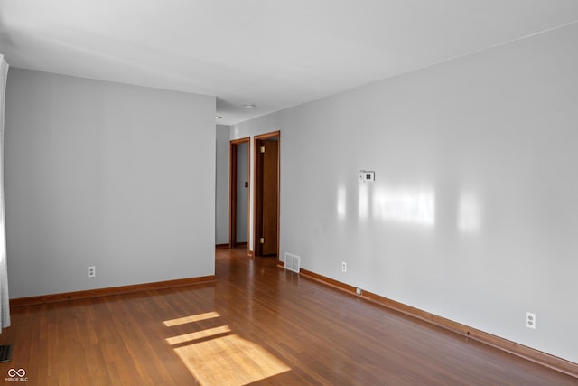 320 S Odell St, Brownsburg, IN 46112 - spare room featuring wood finished floors and baseboards