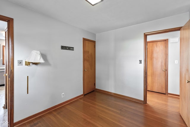 320 S Odell St, Brownsburg, IN 46112 - spare room featuring wood finished floors and baseboards
