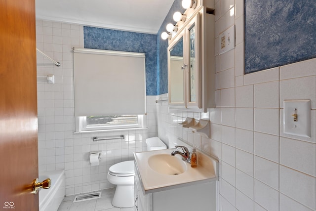 320 S Odell St, Brownsburg, IN 46112 - bathroom featuring tile walls, vanity, and tile patterned floors