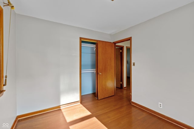 320 S Odell St, Brownsburg, IN 46112 - unfurnished bedroom with wood finished floors and a closet