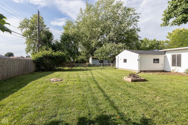320 S Odell St, Brownsburg, IN 46112 - fenced backyard featuring an outdoor fire pit