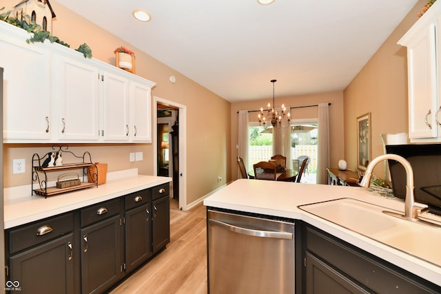 1603 Oakmere Way, Greenwood, IN 46142 - kitchen featuring white cabinets, dishwasher, light wood finished floors, a chandelier, and light countertops
