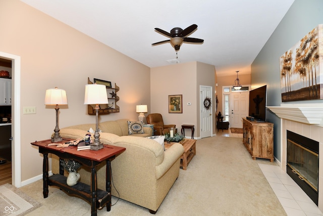 1603 Oakmere Way, Greenwood, IN 46142 - living area featuring a ceiling fan, a fireplace, and light colored carpet