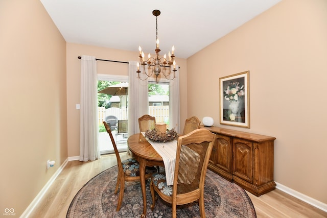 1603 Oakmere Way, Greenwood, IN 46142 - dining space with a chandelier and light wood-style floors