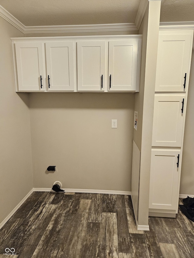 3920 Brandywyne Dr, North Vernon, IN 47265 - laundry room with dark wood-style flooring and crown molding