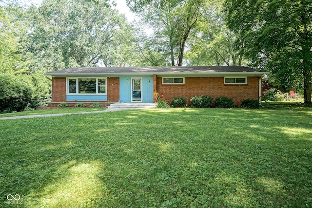4720 Kessler View Dr, Indianapolis, IN 46220 - ranch-style home featuring a front lawn and brick siding