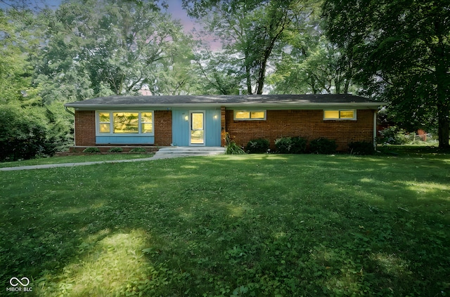 4720 Kessler View Dr, Indianapolis, IN 46220 - single story home with a front lawn, a chimney, and brick siding