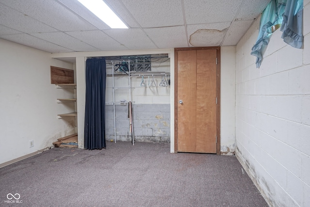4720 Kessler View Dr, Indianapolis, IN 46220 - finished basement featuring carpet, concrete block wall, and a paneled ceiling