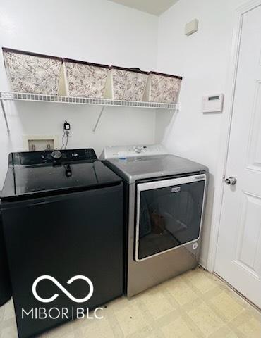 19519 Prairie Crossing Dr, Noblesville, IN 46062 - laundry room featuring independent washer and dryer and light flooring