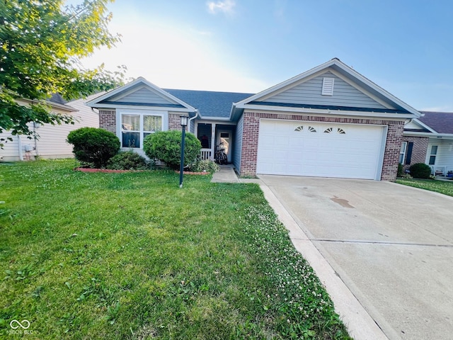 19519 Prairie Crossing Dr, Noblesville, IN 46062 - ranch-style home featuring brick siding, an attached garage, concrete driveway, and a front lawn